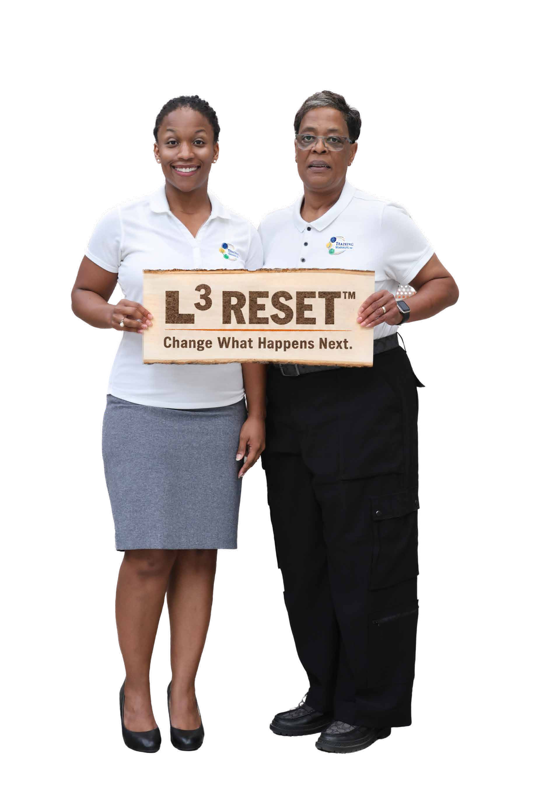 Julia Baxter and Dyann McDowell holding the L³ RESET sign